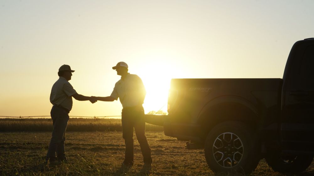 handshake-sunset-truck