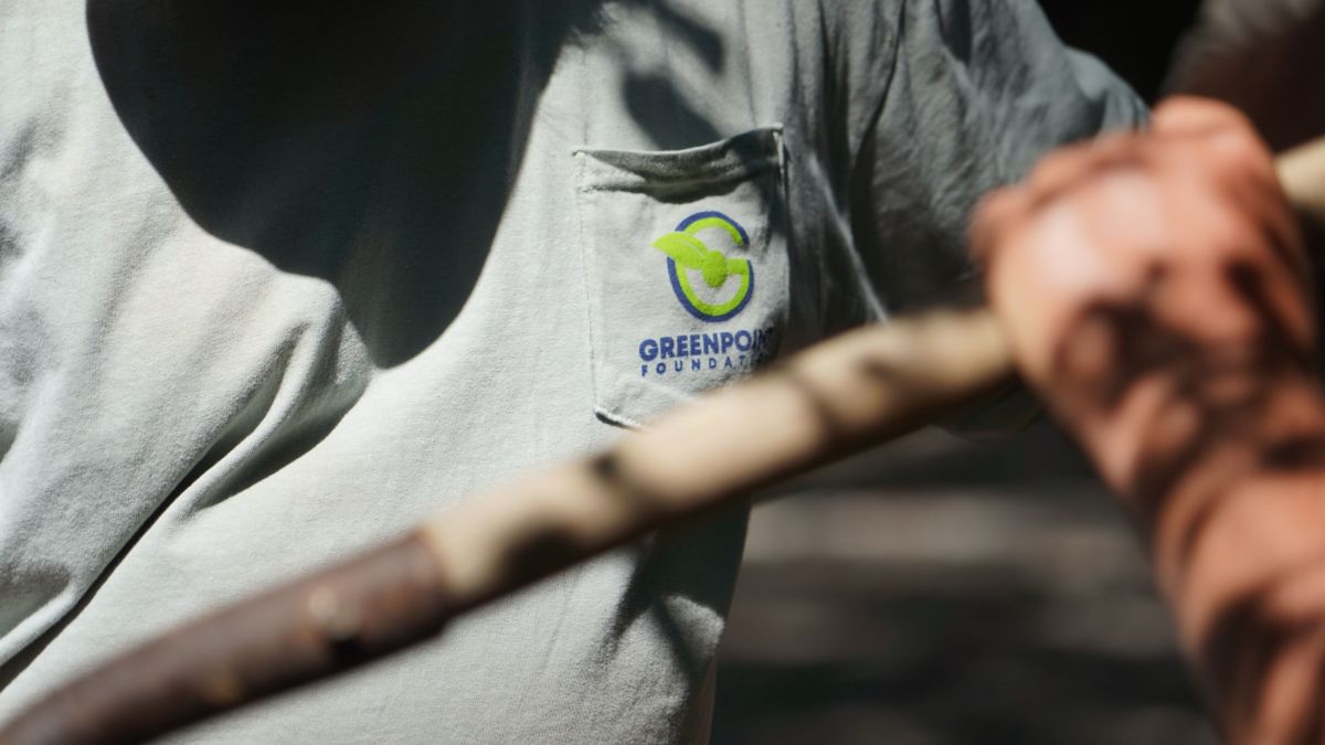 Upclose of GreenPoint Foundation logo on Shirt
